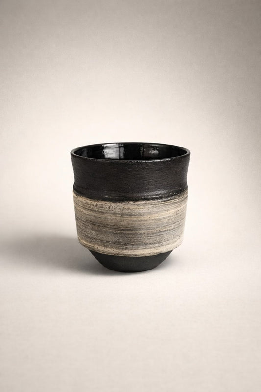 Handmade black and white stoneware ceramic mug